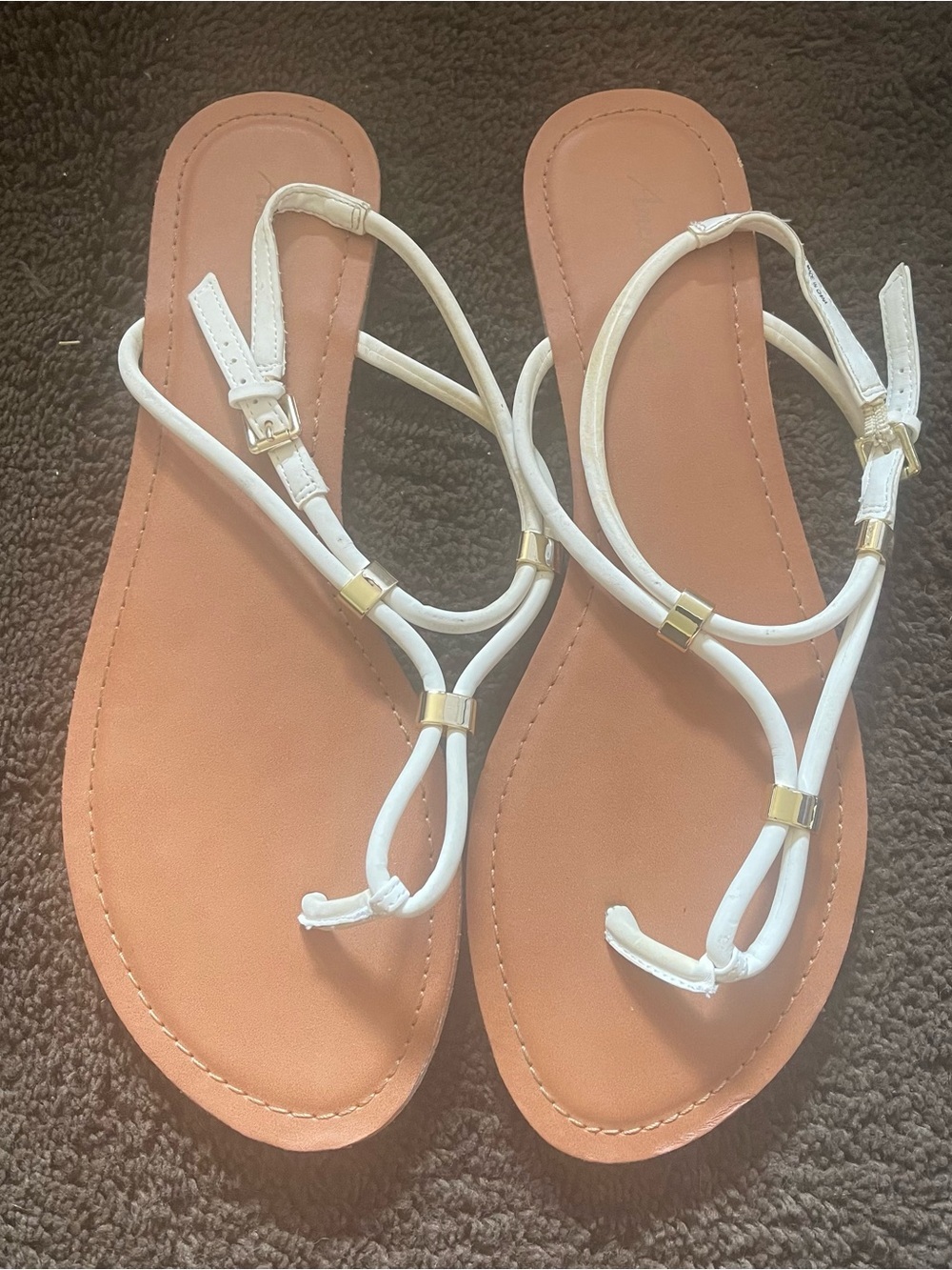 White Strappy Toe-Loop Sandals with Gold Accents